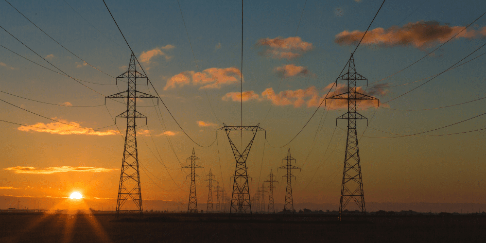 Powerlines against a sunset